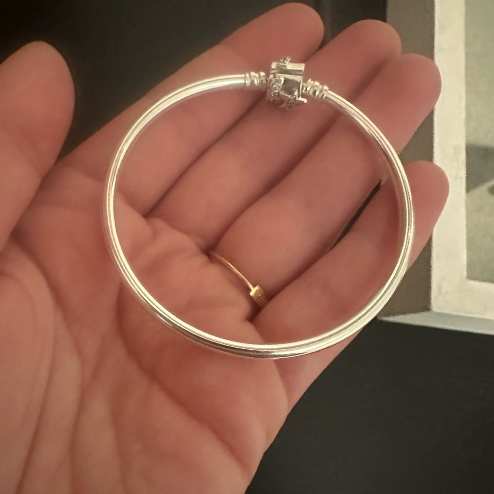New Pandora sterling silver charm bangle no charms included. LIMITED EDITION